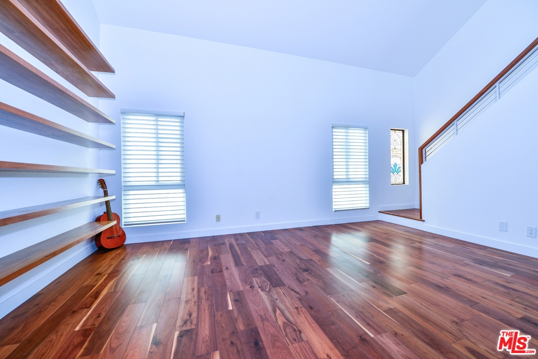 914 2nd Street, Unit B Santa Monica, CA 90403 - Photo 17 of 29 a view of empty room with wooden floor and fan