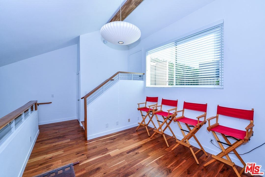 914 2nd Street, Unit B Santa Monica, CA 90403 - Photo 18 of 29 a view of a room with wooden floor and windows
