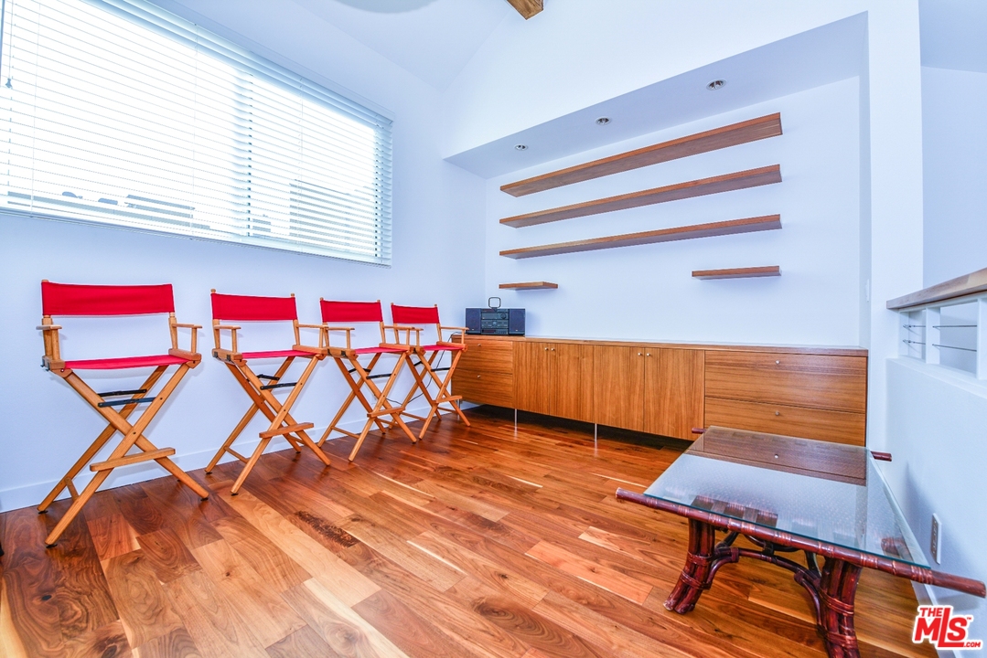914 2nd Street, Unit B Santa Monica, CA 90403 - Photo 22 of 29 a room with a bed and a window