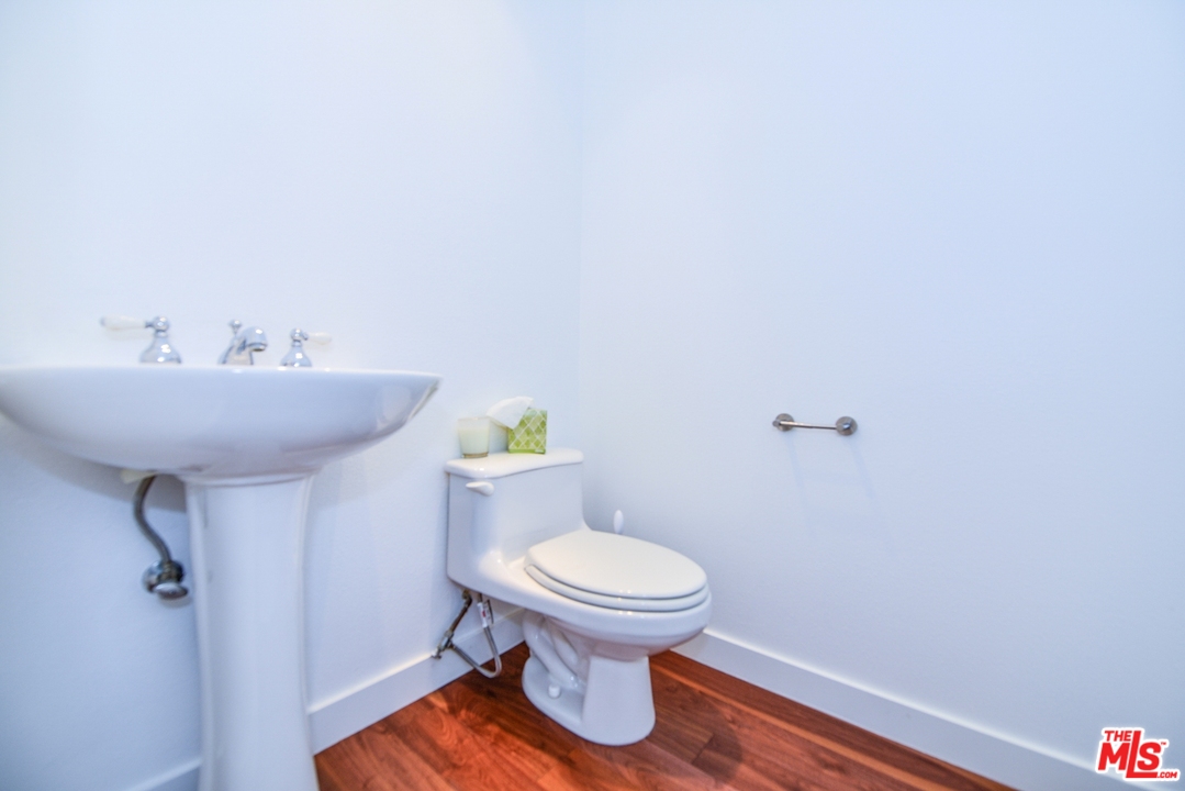 914 2nd Street, Unit B Santa Monica, CA 90403 - Photo 8 of 29 a bathroom with a sink and a toilet