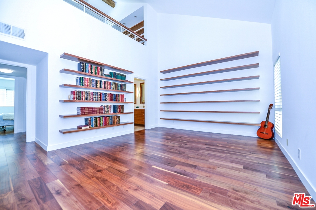 914 2nd Street, Unit B Santa Monica, CA 90403 - Photo 9 of 29 a view of a room with wooden floor and shoes