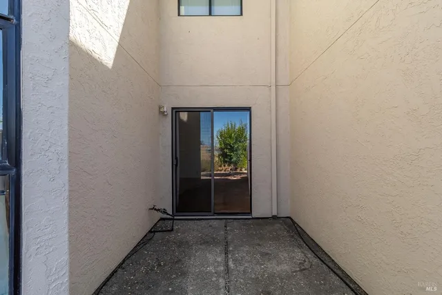 a view of a patio near an ocean