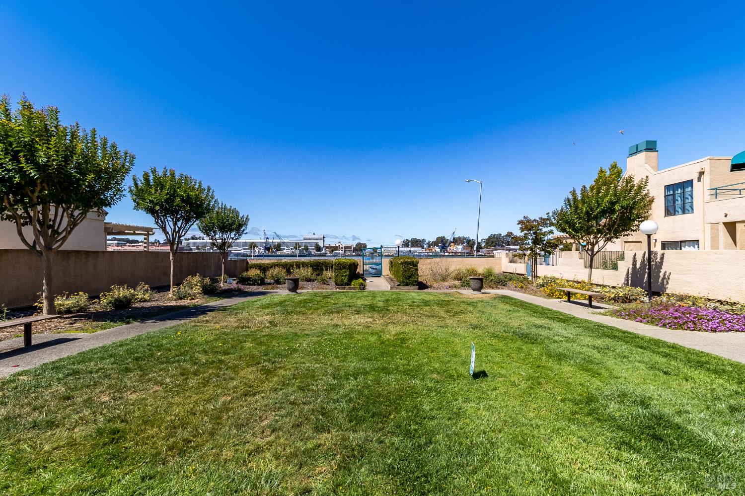 171 Nantucket Lane Vallejo, CA 94590 - Photo 33 of 56 a view of backyard with a table and chairs