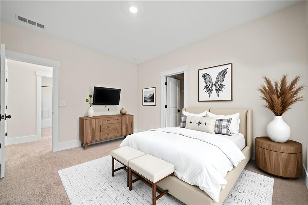 3769 Cheyenne Lane Jefferson, GA 30549 - Photo 33 of 49 a bedroom with a bed a window and a television