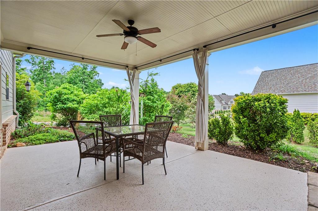 3769 Cheyenne Lane Jefferson, GA 30549 - Photo 37 of 49 a view of a patio with a table and chairs