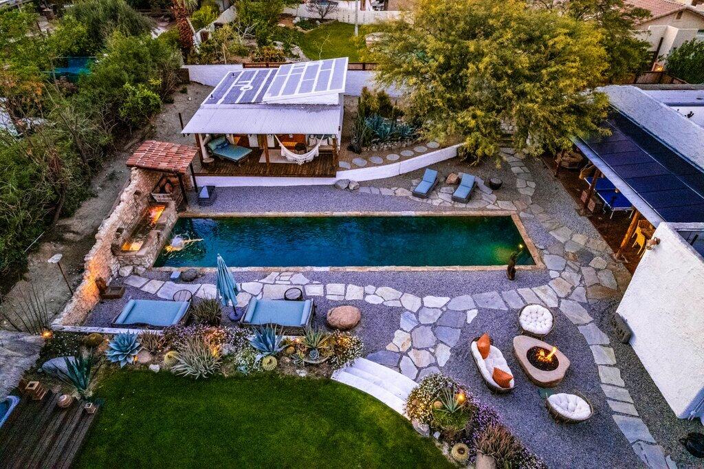 71607 Sahara Road Rancho Mirage, CA 92270 - Photo 110 of 118 SA - 64.jpg-drone-pool-grass-guest-dusk