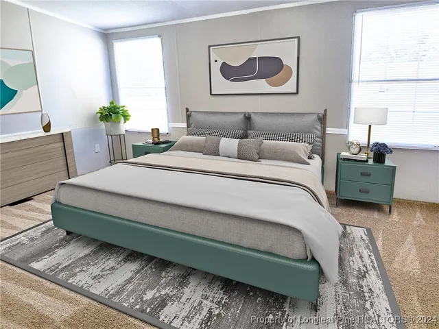 a bedroom with a bed lamp and a potted plant