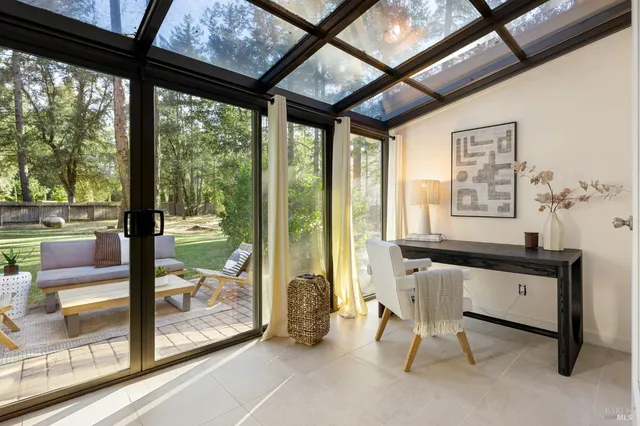 a view of swimming pool with lounge chairs