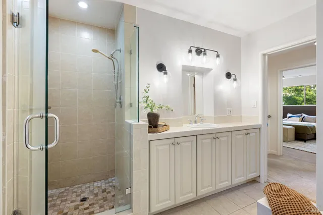 front view of a house with a tree