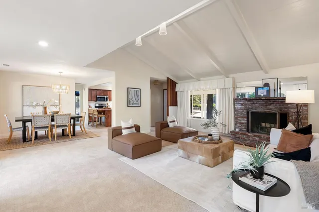 a view of a dining room with furniture window and outside view