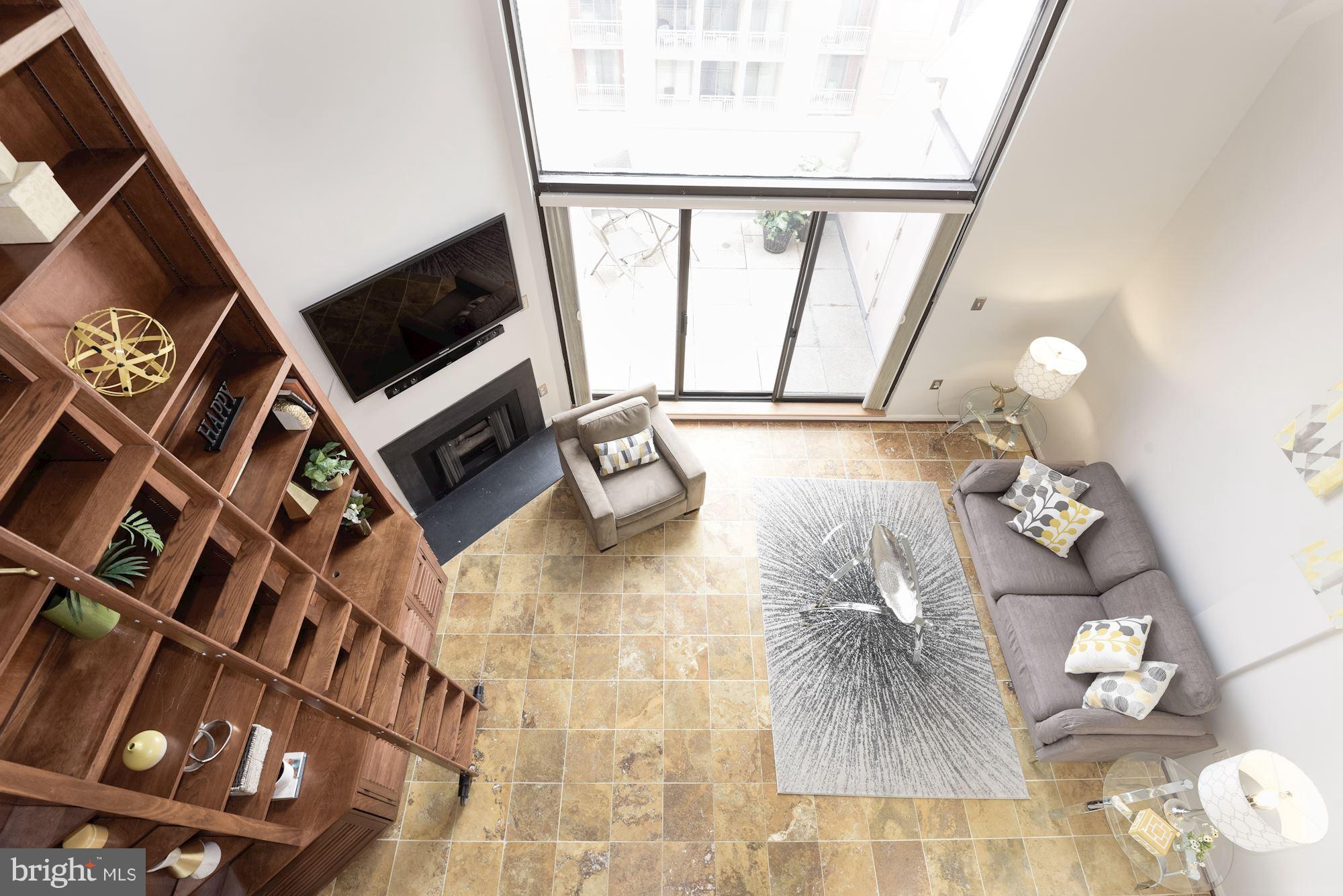 1301 North Courthouse Road, Unit 1812 Arlington, VA 22201 - Photo 9 of 30 2-story LR has fireplace and lots of light!