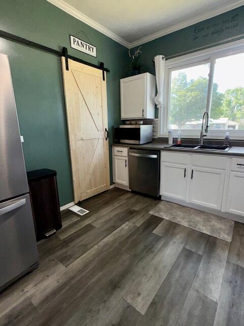 806 North 4th Street Kentland, IN 47951 - Photo 12 of 29 a kitchen with granite countertop a sink a window appliances and cabinets