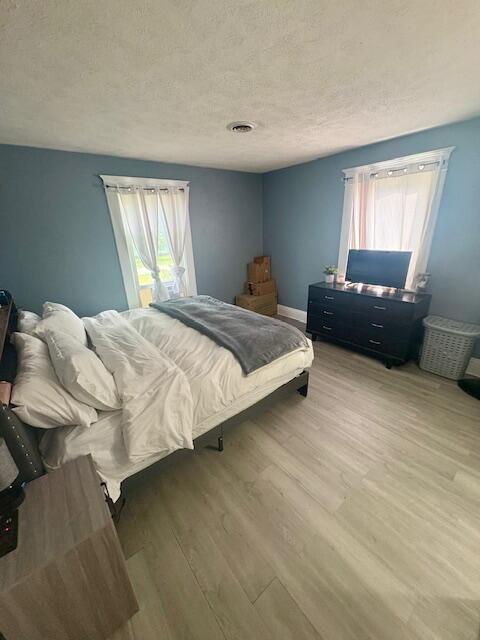 806 North 4th Street Kentland, IN 47951 - Photo 20 of 29 a bedroom with a bed and window