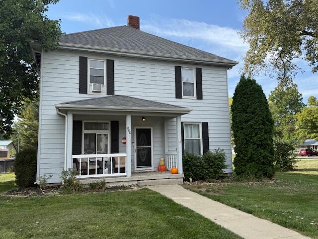 806 North 4th Street Kentland, IN 47951 - Photo 2 of 29 a front view of a house with a yard