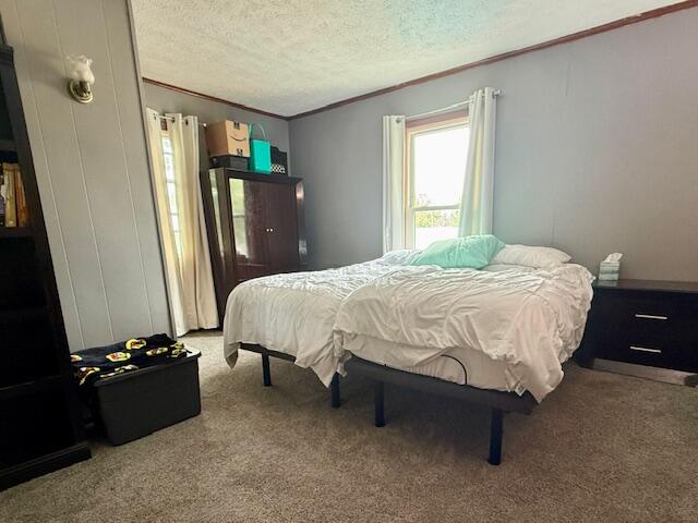 806 North 4th Street Kentland, IN 47951 - Photo 23 of 29 a bedroom with a bed dresser and a window