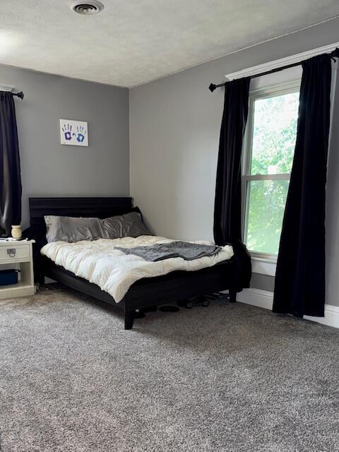 806 North 4th Street Kentland, IN 47951 - Photo 26 of 29 a bedroom with a bed and a window