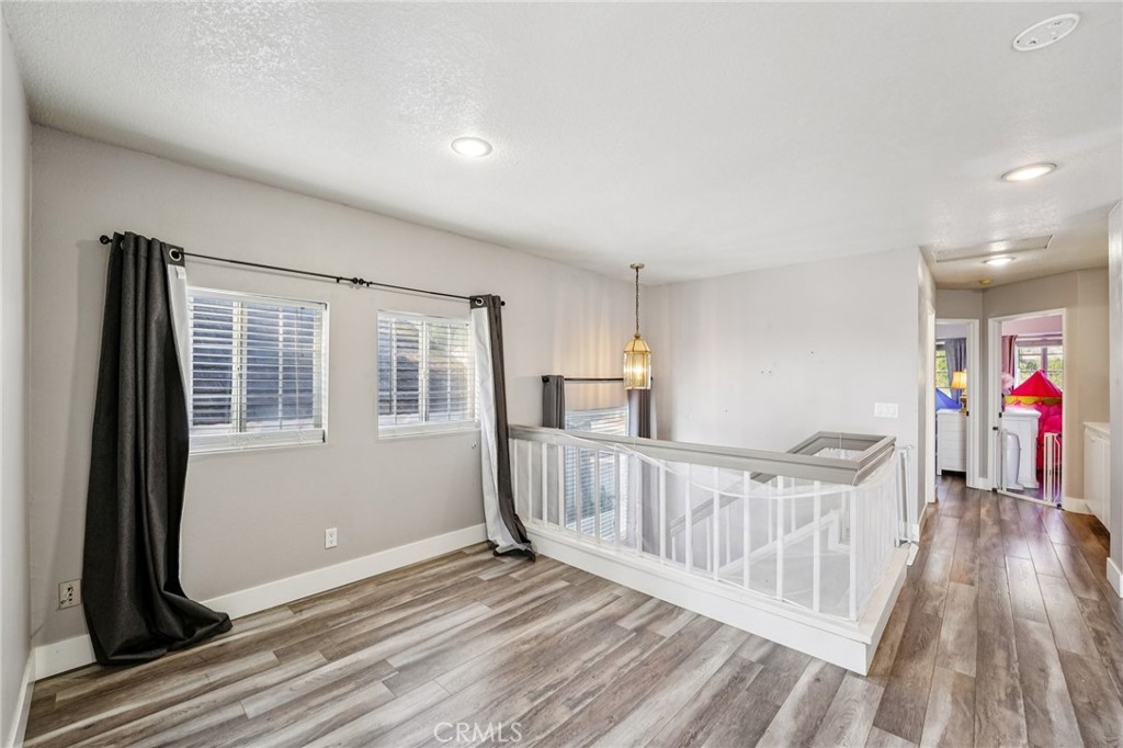 17586 Mountain Court Riverside, CA 92503 - Photo 12 of 39 a view of an entryway with wooden floor