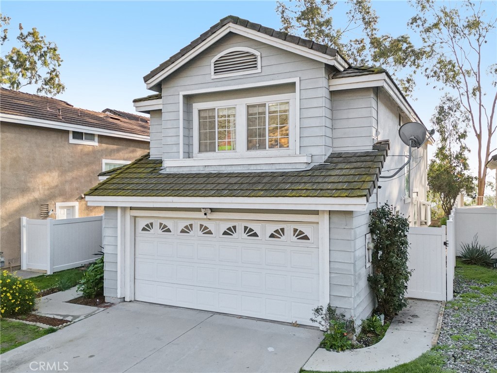 17586 Mountain Court Riverside, CA 92503 - Photo 2 of 39 a front view of a house with garage