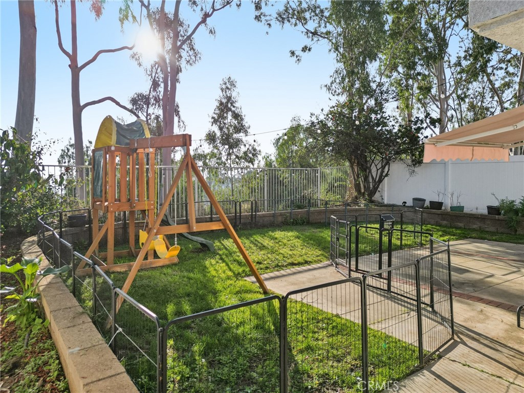 17586 Mountain Court Riverside, CA 92503 - Photo 26 of 39 a view of backyard with swimming pool and outdoor seating