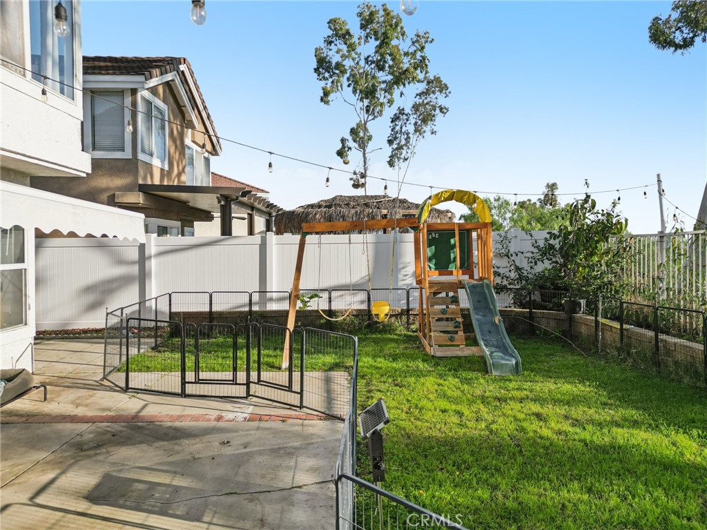 17586 Mountain Court Riverside, CA 92503 - Photo 27 of 39 a view of a house with a backyard