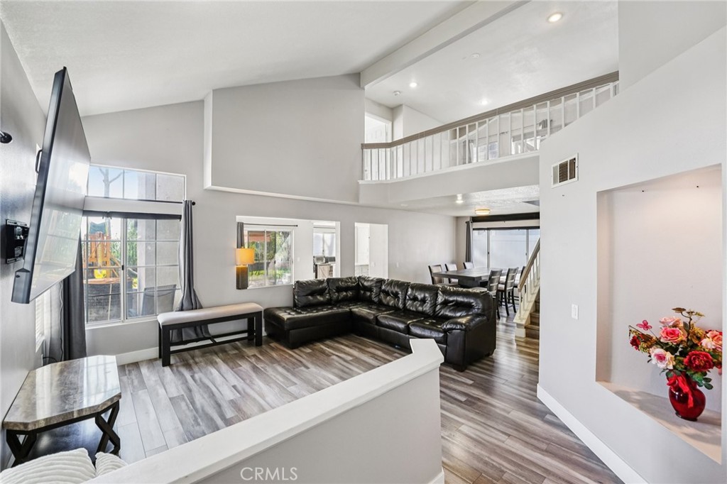 17586 Mountain Court Riverside, CA 92503 - Photo 3 of 39 a living room with furniture and wooden floor