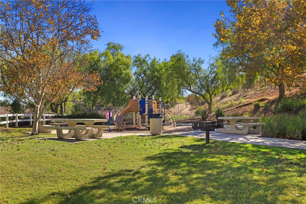 17586 Mountain Court Riverside, CA 92503 - Photo 32 of 39 a view of a park with swings and slides