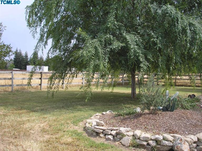 122 South Anderson Road Exeter, CA 93221 - Photo 25 of 26 a view of a lake view with a fountain