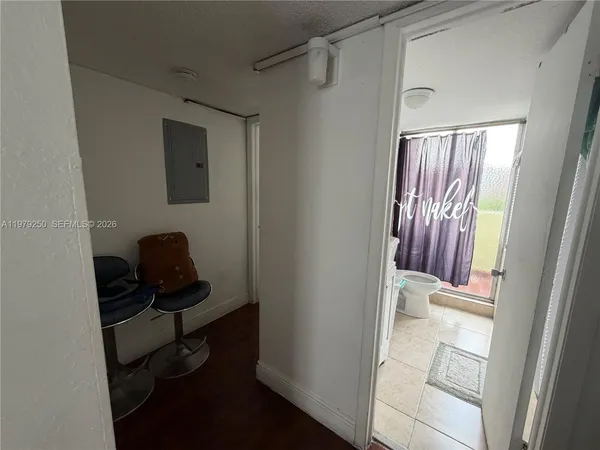 a view of a hallway and a workspace