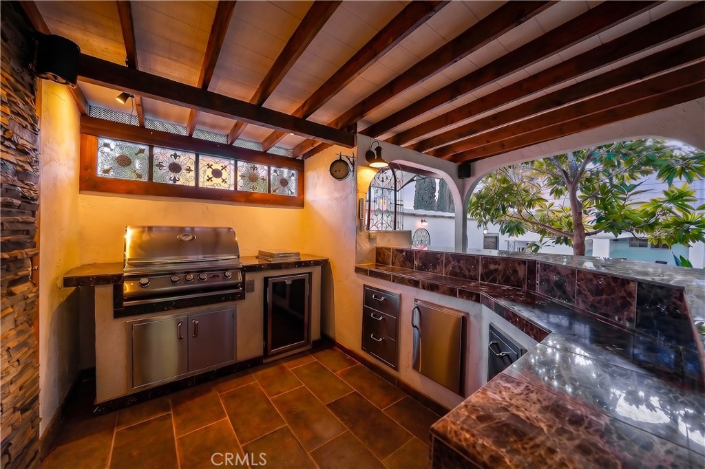 23734 Vista Ramona Road Ramona, CA 92065 - Photo 19 of 62 a kitchen with stainless steel appliances granite countertop a stove and a sink