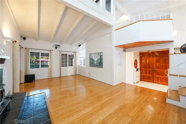 a large kitchen with cabinets and stainless steel appliances