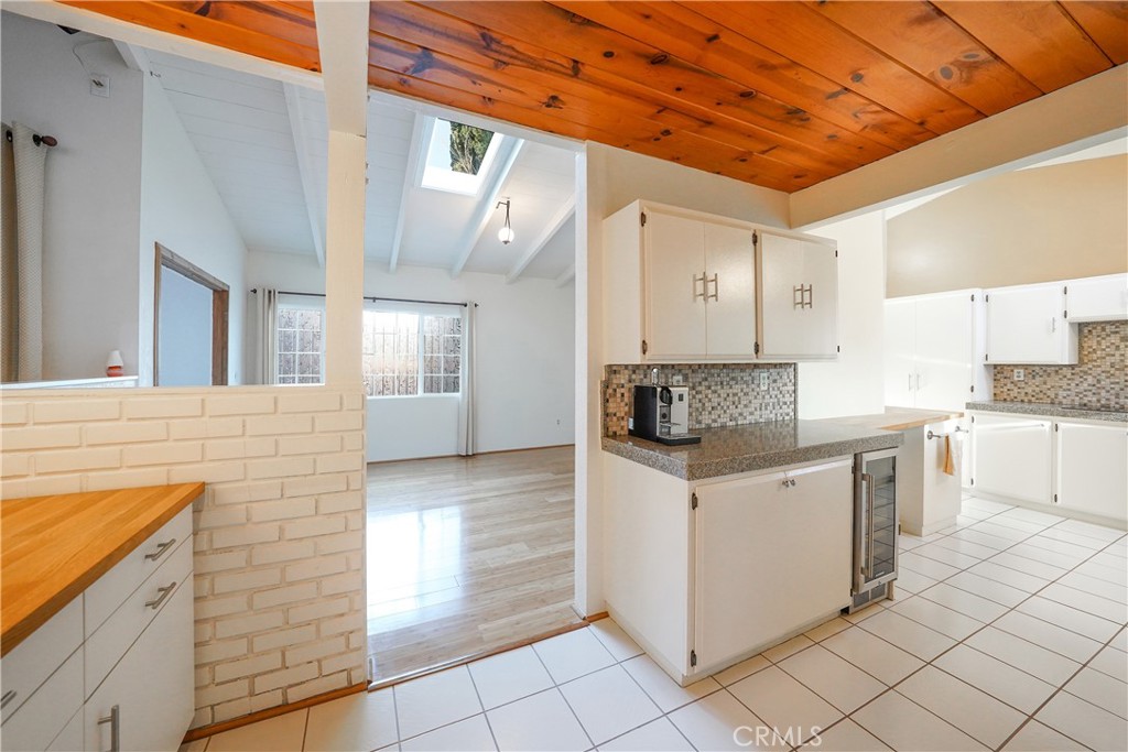 23734 Vista Ramona Road Ramona, CA 92065 - Photo 31 of 62 a kitchen with stainless steel appliances granite countertop a sink and cabinets