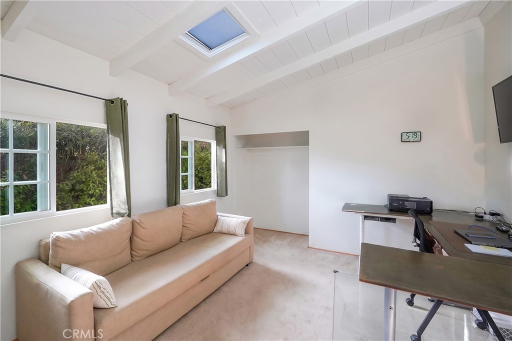 23734 Vista Ramona Road Ramona, CA 92065 - Photo 41 of 62 a living room with furniture and a window