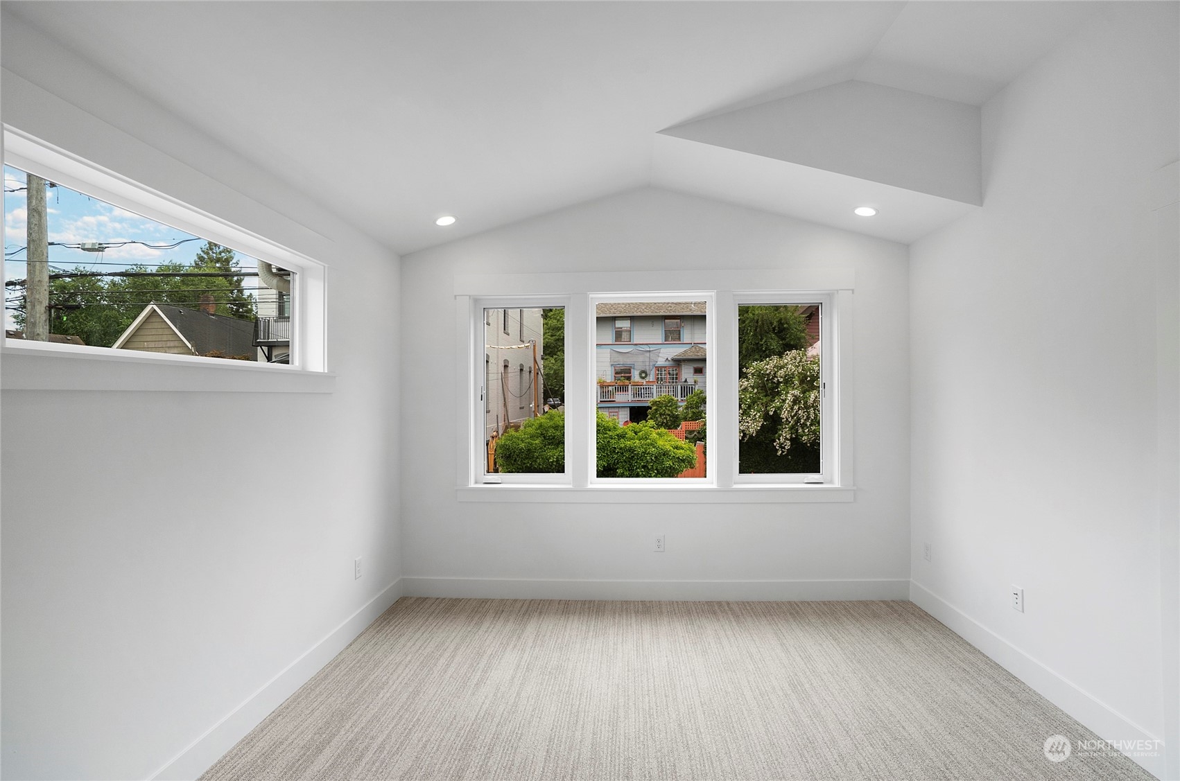 1619 3rd Avenue West Seattle, WA 98119 - Photo 11 of 28 an empty room with a window