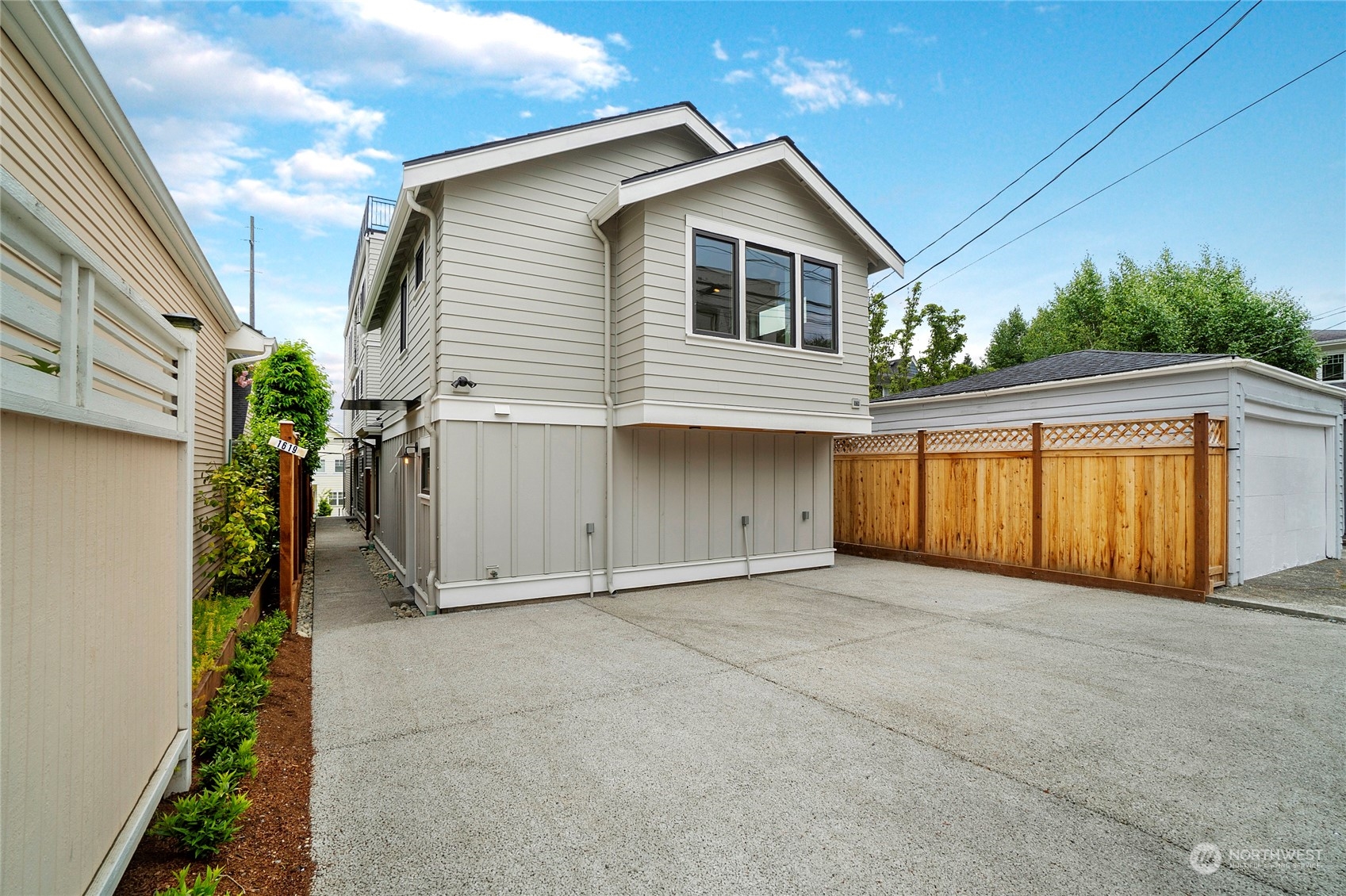 1619 3rd Avenue West Seattle, WA 98119 - Photo 22 of 28 a view of a house with porch