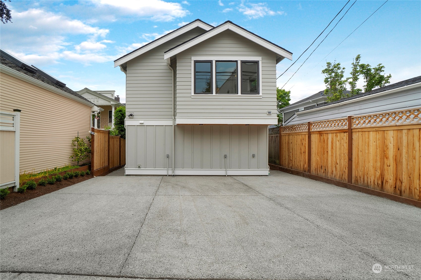 1619 3rd Avenue West Seattle, WA 98119 - Photo 23 of 28 a view of backyard of house