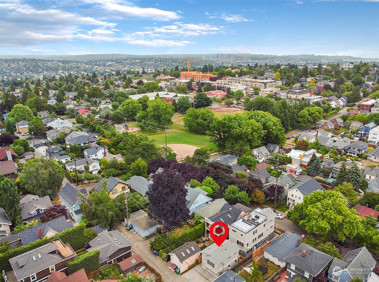 1619 3rd Avenue West Seattle, WA 98119 - Photo 27 of 28 an aerial view of residential houses with outdoor space