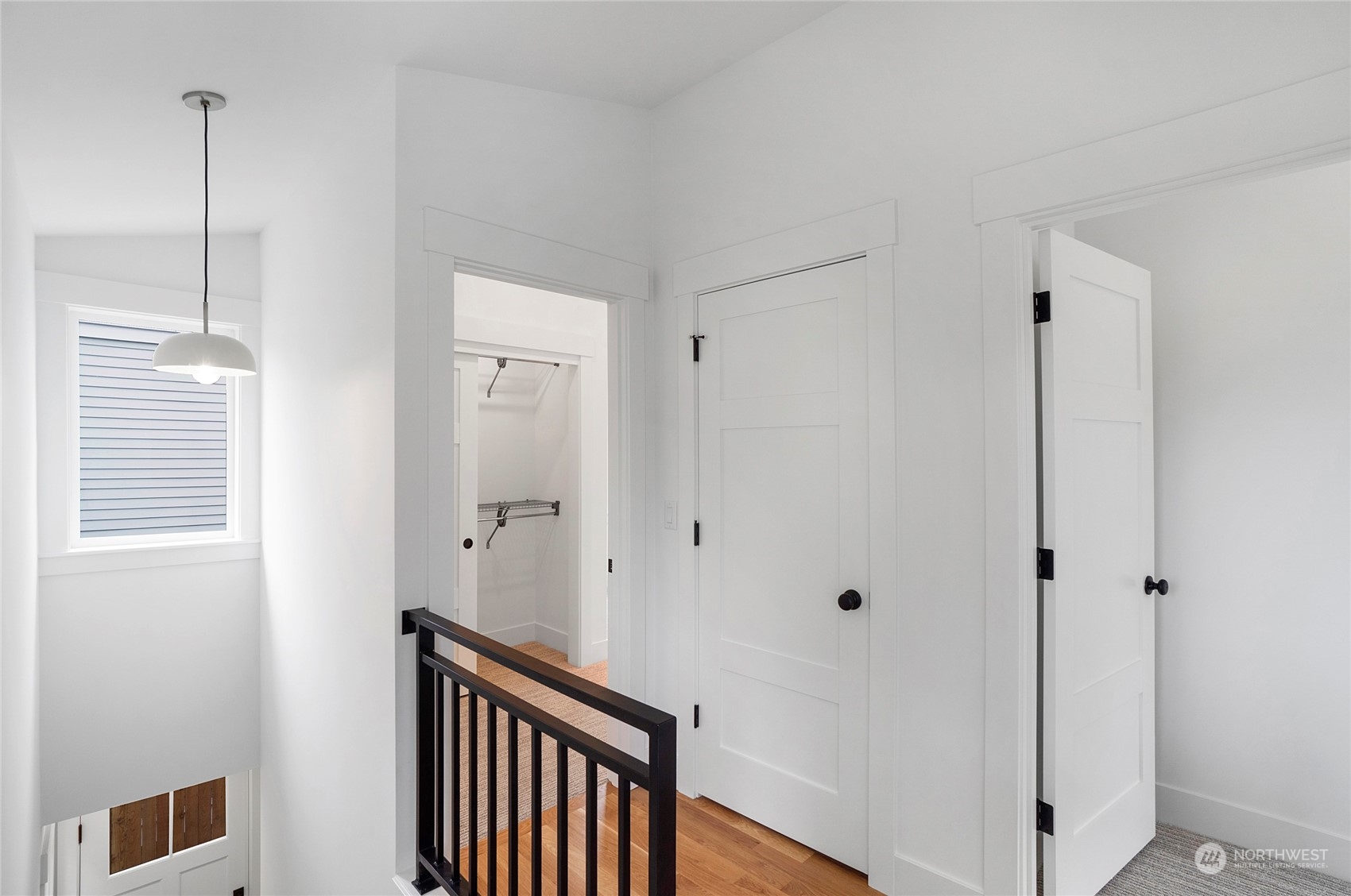1619 3rd Avenue West Seattle, WA 98119 - Photo 10 of 28 a view of a hallway with closet area