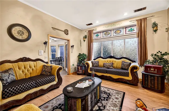 a kitchen with stainless steel appliances granite countertop a refrigerator and a stove