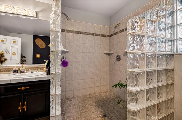 a view of a livingroom with workspace and a couch