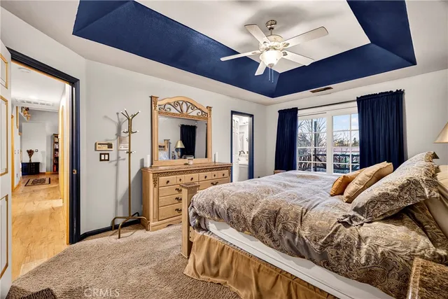 a view of a two chairs in the patio