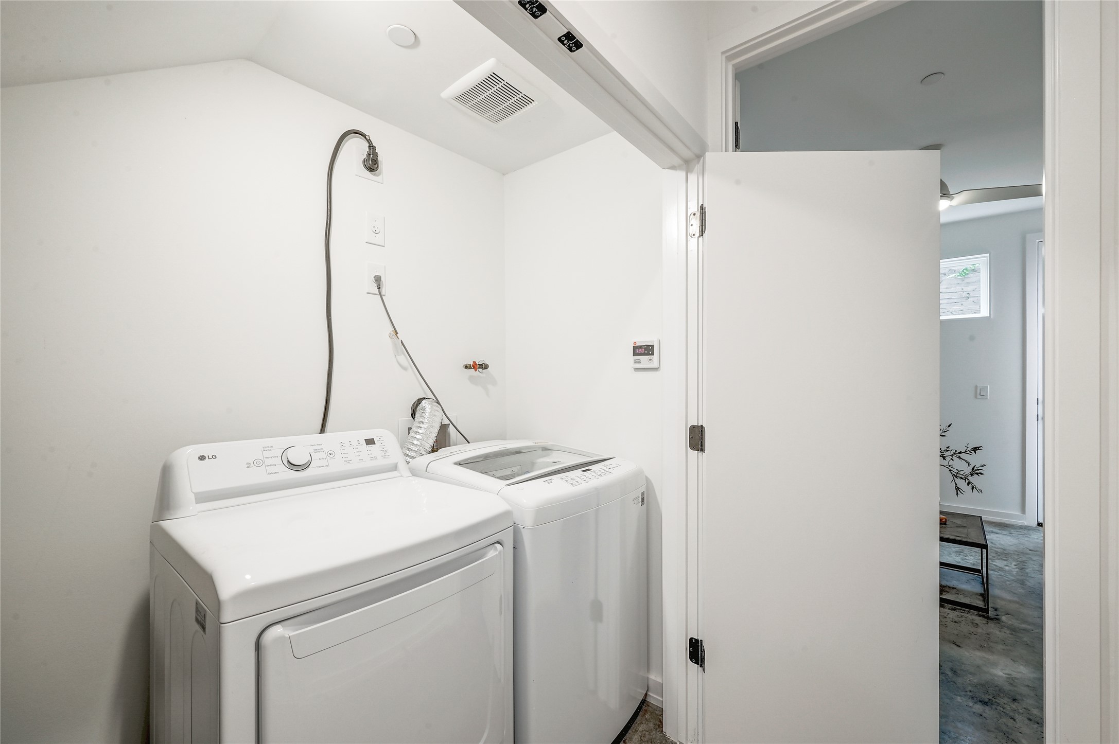 410 West Alpine Road, Unit 7 Austin, TX 78704 - Photo 19 of 26 a utility room with dryer and washer
