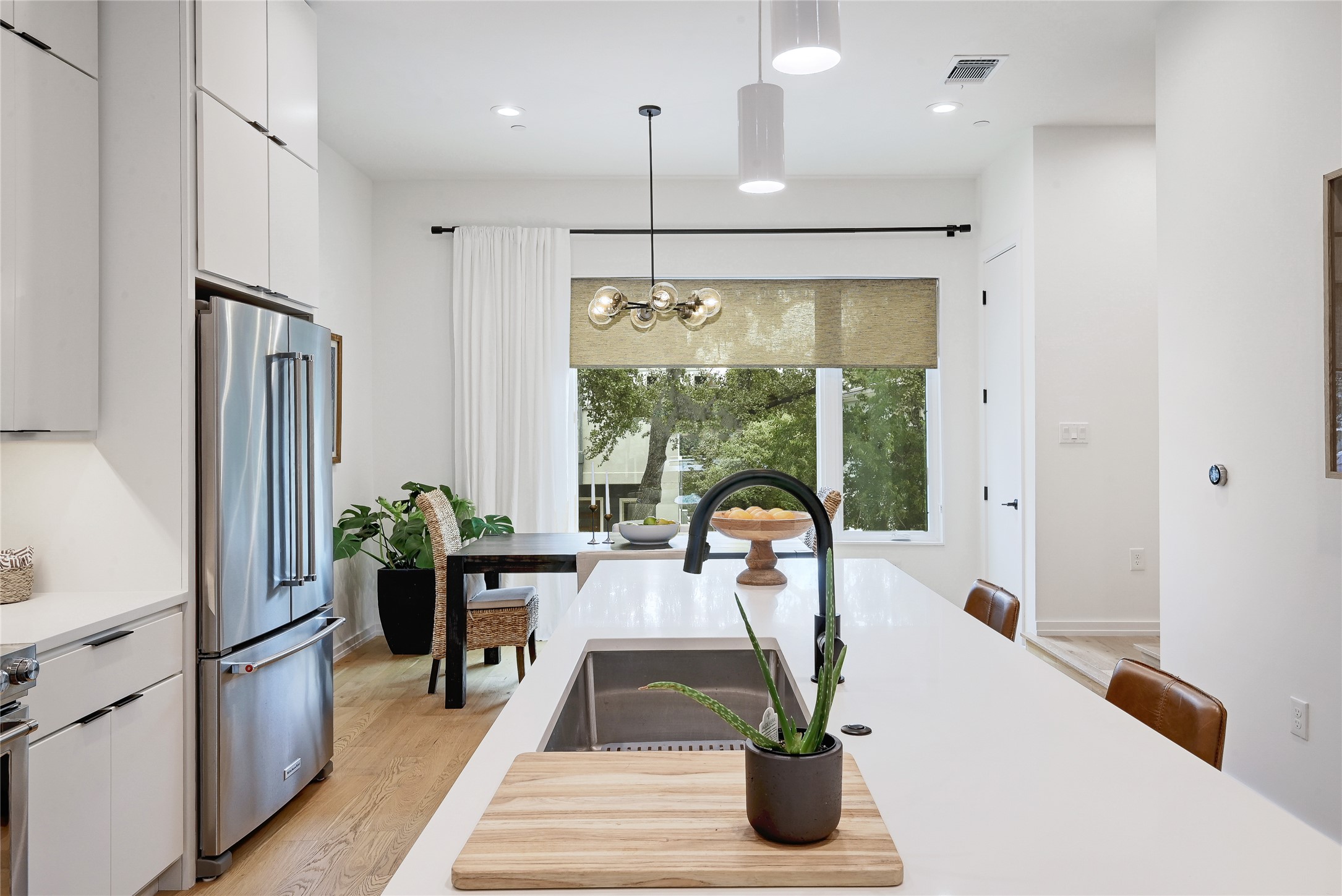 410 West Alpine Road, Unit 7 Austin, TX 78704 - Photo 6 of 26 a very nice looking room with a large window and stainless steel appliances