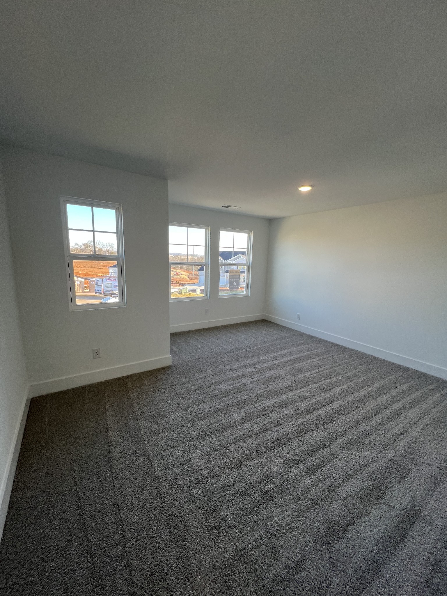 304 Strong Street Columbia, TN 38401 - Photo 18 of 49 an empty room with windows