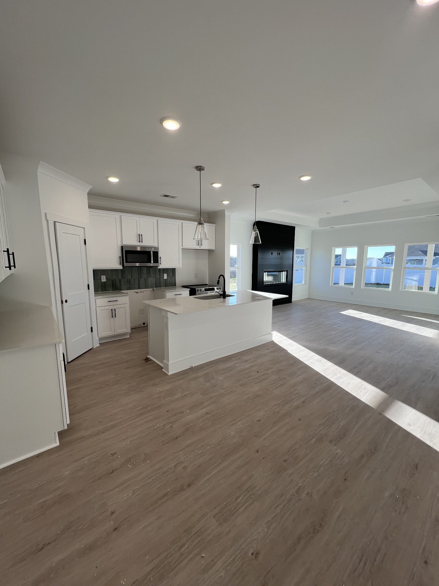 304 Strong Street Columbia, TN 38401 - Photo 5 of 49 a large kitchen with a large window and stainless steel appliances