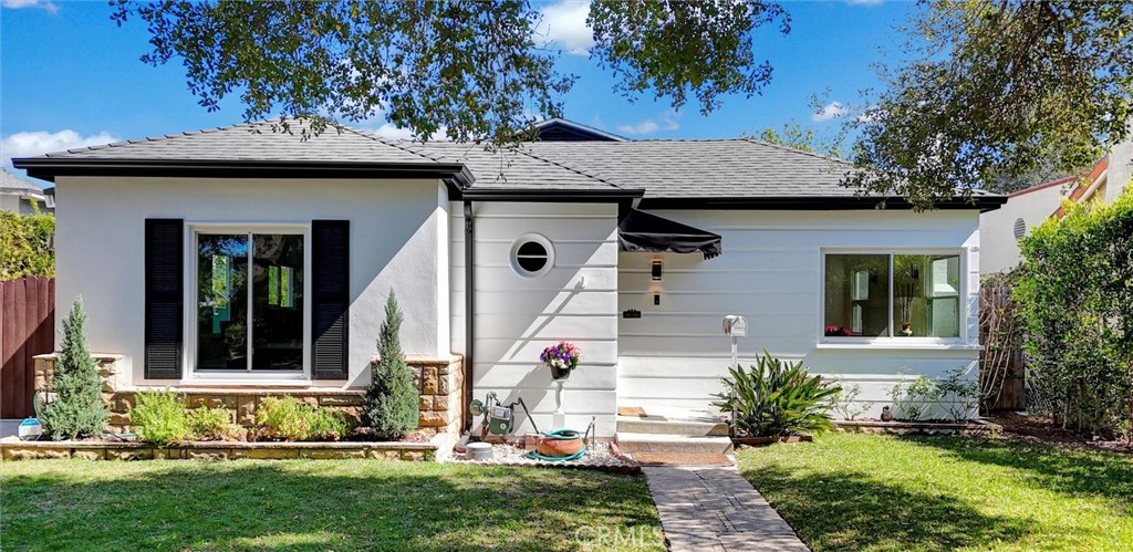 250 South Berkeley Avenue Pasadena, CA 91107 - Photo 1 of 1 a front view of a house with a yard