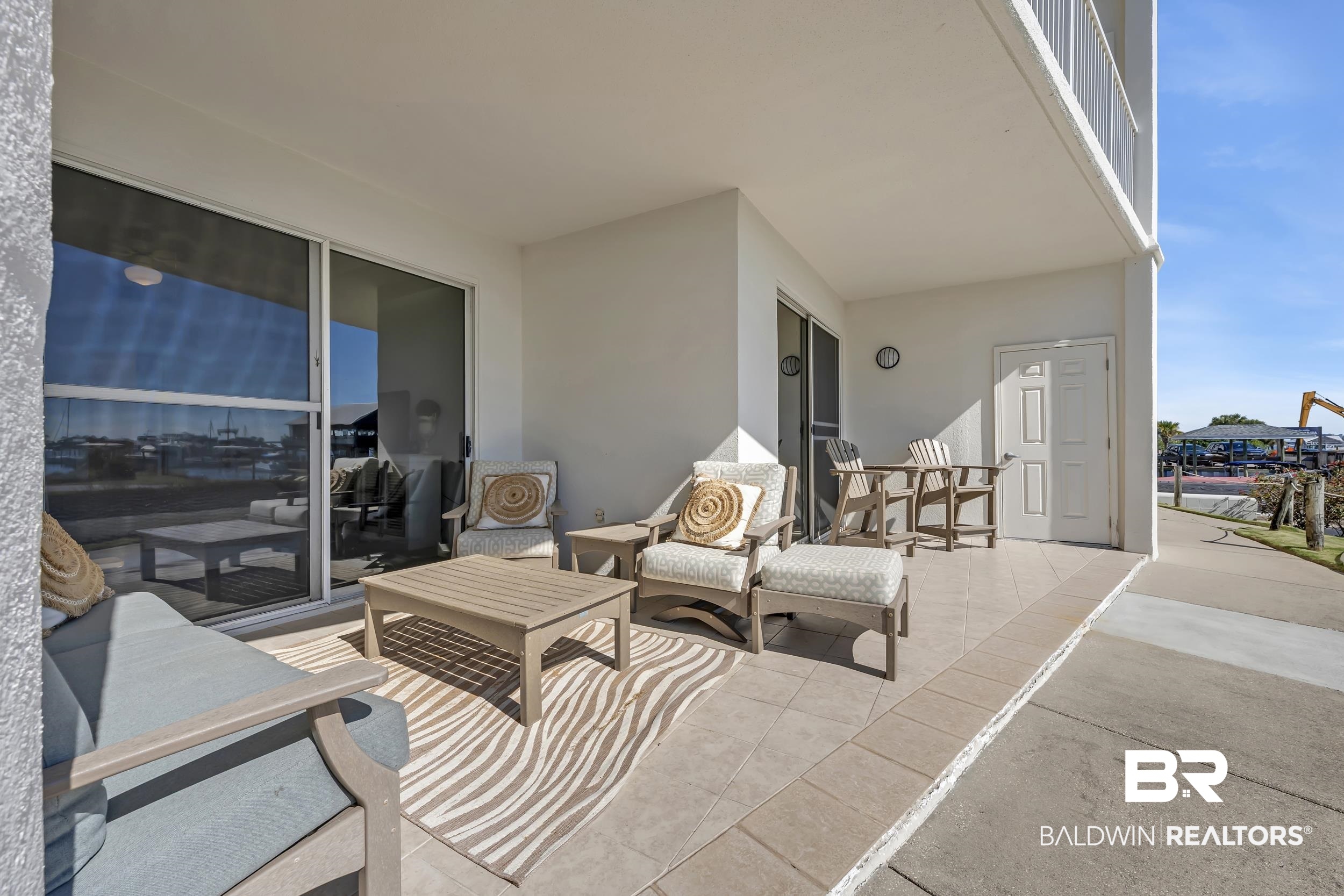 27282 Canal Road, Unit 104 Orange Beach, AL 36561 - Photo 38 of 79 View of patio / terrace featuring an outdoor hangout area