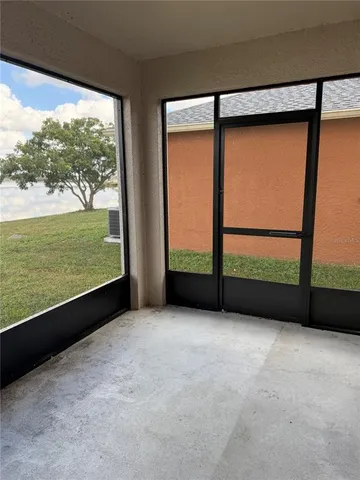 a view of a big room with an outdoor view