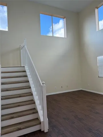 a view of entryway with wooden floor
