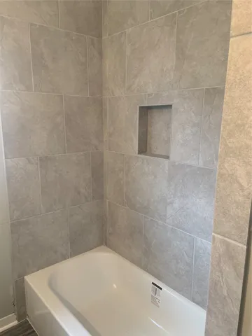 a bathroom with a bathtub