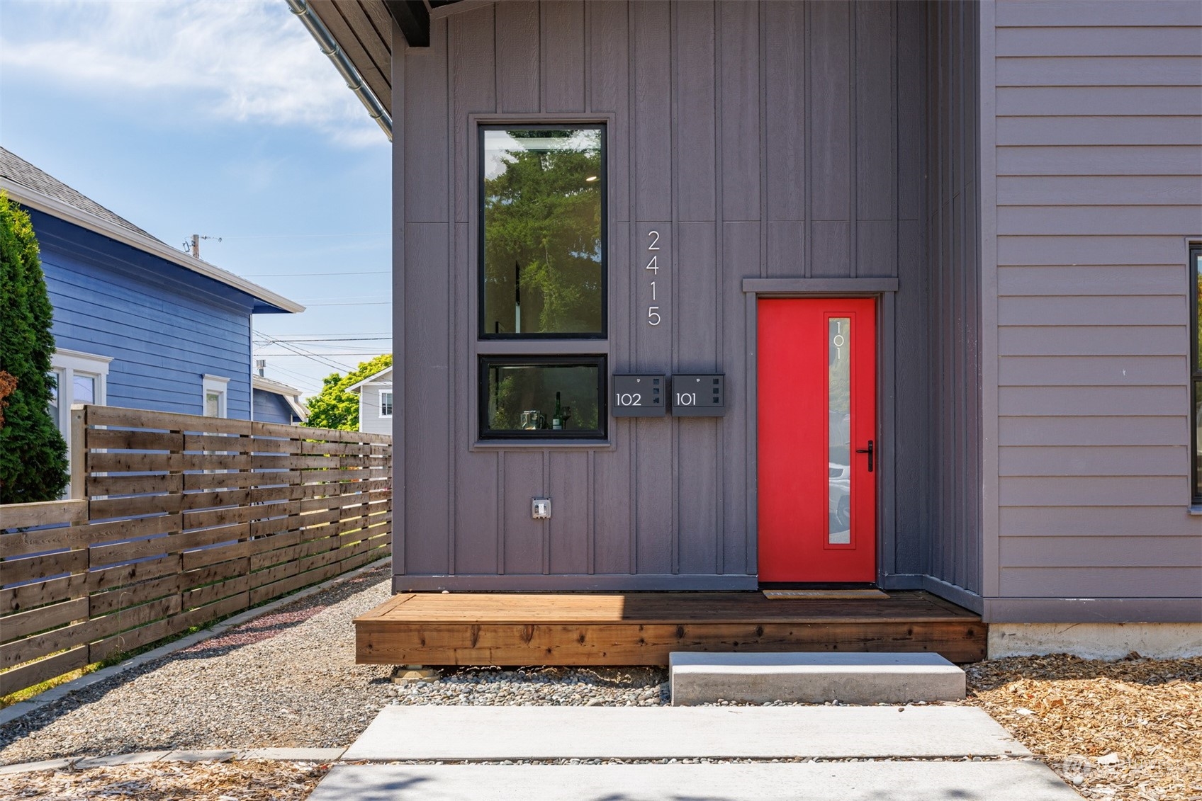 2415 Pacific Street Bellingham, WA 98229 - Photo 2 of 40 a wooden door with red door